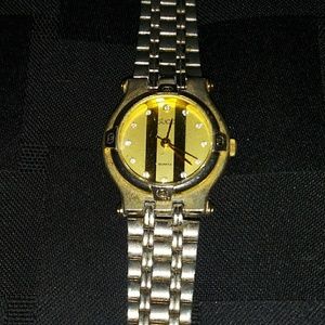 Vintage Gucci watch real diamonds and gold.